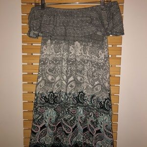 Off the shoulder intricate dress.